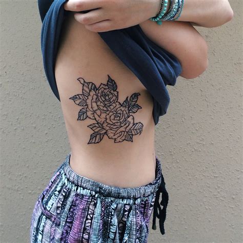The rib cage area is a really stunning canvas for tattoos, if they take advantage of the uniqueness of that particular body area and are done well.here are. 30+ Flowers Tattoos On Side Rib