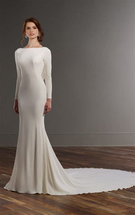 Book an appointment for a fitting at our bridal shop in london. Long sleeved wedding dress with bateau neckline - Martina ...