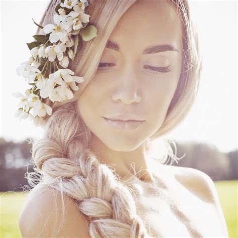 Use white orchids or any other white or bright flowers as an accent. 14 Beach Wedding Hair Ideas You Need To See Now