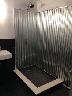 We are putting corrugated tin as our bathtub surround. Rustic corrugated metal spa shower pebbles river rock walk ...