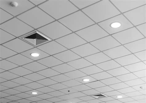 The only suspended drop ceiling tiles i've seen that are appealing are found under this article drop ceiling vs. Types Of Ceiling Tiles For Commercial & Residential ...