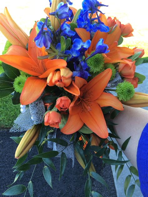 Maybe you would like to learn more about one of these? Orange, royal blue and lime green wedding bouquet. Made by ...
