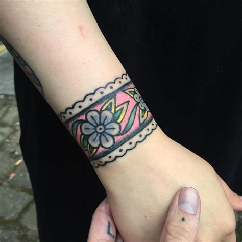 95 significant armband tattoos meanings and designs 2019. Floral wristband tattoo on the wrist (With images) | Wrist ...