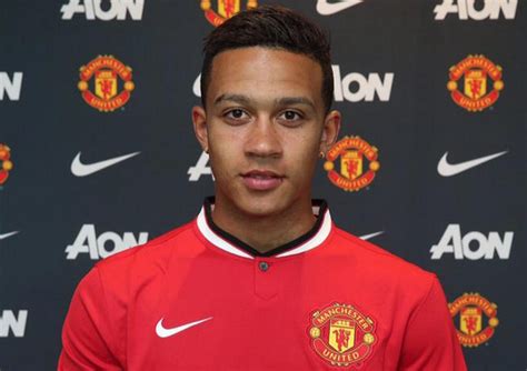 After guiding lyon to a historic champions league his father, denis was from ghana and his mother, cora schensema was from netherlands. Photos Memphis Depay in a Manchester United Shirt