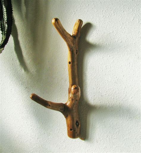 The cast iron branch wall hook measures 5 long. Three hooked Juniper tree branch Wall Hook for hat rack ...