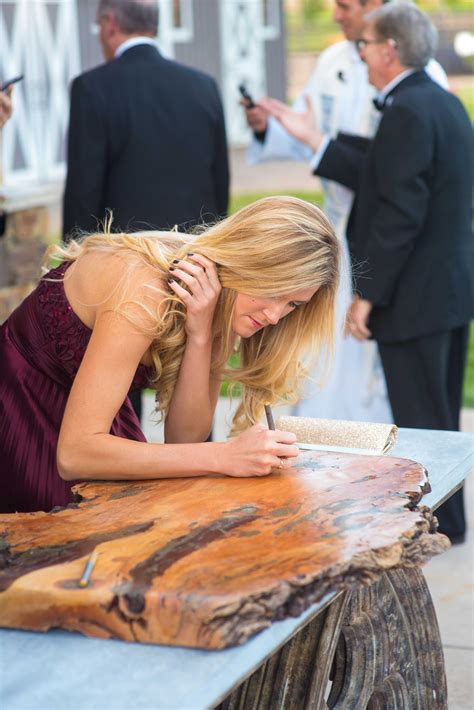 Rustic wood meets modern metal to create this striking—and timeless—piece of furniture. 11 Unique Alternatives to a Traditional Wedding Guest Book | tabla | Wood guest book, Wedding ...