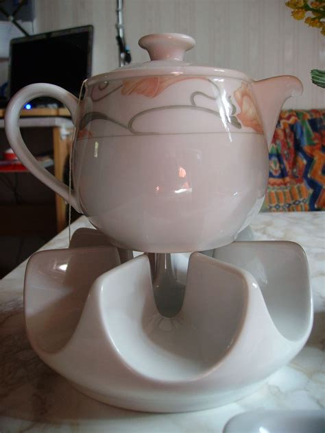 To easily fill the kettle with just the right amount of water. Teapot with warmer | Tea pots, Tea cups, Kitchen aid mixer