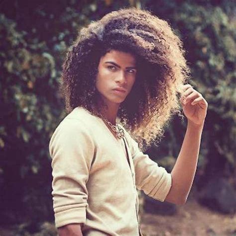 This type of haircut has a close resemblance to the afro fade, the only difference between the two is the hair texture. 10 Curly Hairstyles For Black And Mixed Men - Afroculture.net