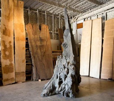 The variegated grain of native ancient bay laurel trees, salvaged by evan shively of west marin's arborica, lends to the pieces depth of character and expresses the natural beauty of northern california. Evan Shively | alchemyindesign