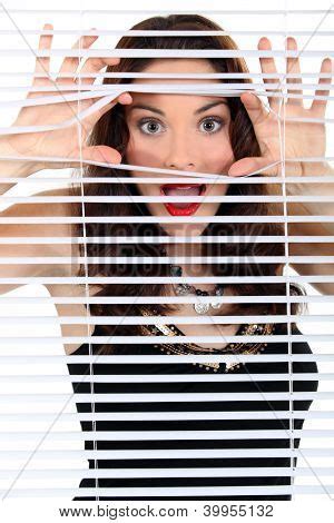 Maybe you would like to learn more about one of these? Woman peeking through blinds Stock Photo & Stock Images ...