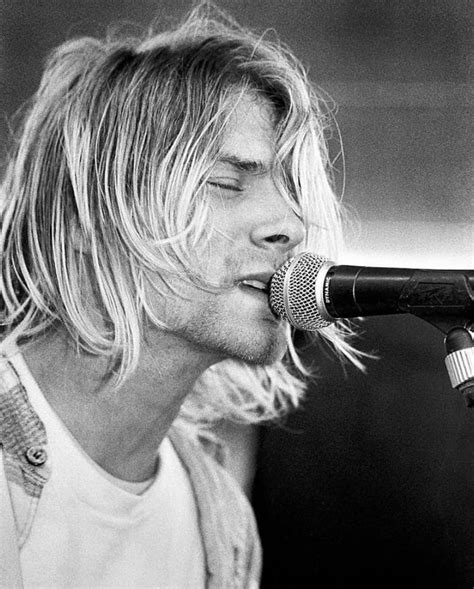 The long blonde hair was one of the many things that made him stand out a mile from the crowd. My favorite picture of Kurt. : Nirvana