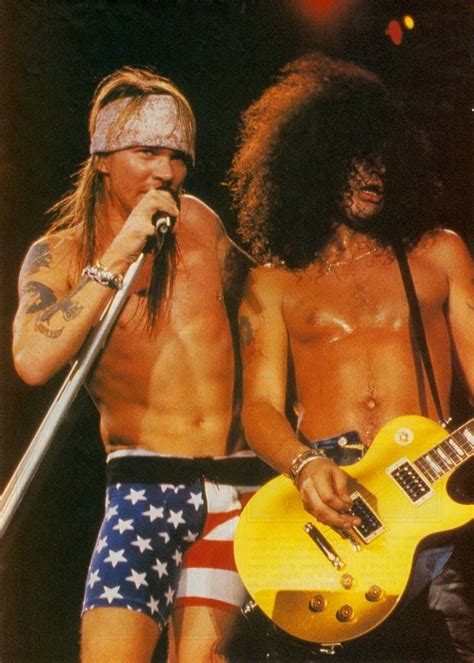 Saul hudson, better known by his stage name slash, is the current lead guitarist of hard rock band guns n' roses. Axl Rose & Slash, early '90s | Axl rose, Guns n roses