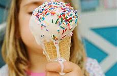 ice cream cone girl eating melting