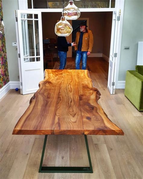 When fully extended, this magnificent table will seat up to twelve people so it's perfect when you've got a crowd to cater for. Sussex Elm Live-Edge Dining Table by Handmade in Brighton ...