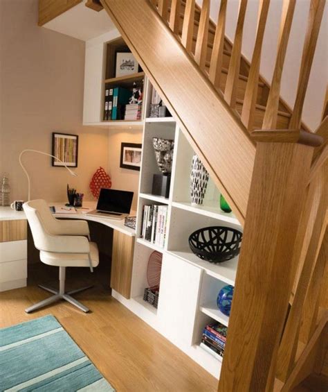 Cabinets are equipped with shelves and hooks. 35+ Inspiring Home Office Design Using Under the Stairs Space #homedecor #homedesign #homeoffice ...