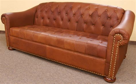 This sofa is made of hardwood in a natural wood finish and upholstered with camel vintage leather features & specifications: Custom Made Camel Tufted Leather Sofa by Dakota Bison ...