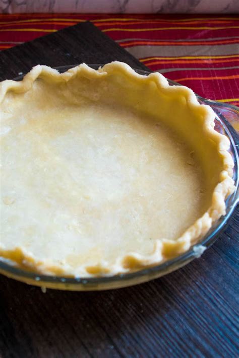 This homemade pie crust recipe is tender, buttery and flaky. Perfect Pie Crust with and without a Food Processor ...