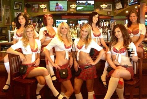 Mature waitress serves a visitor. Tilted Kilt waitresses