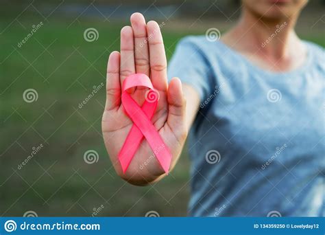 Cancer sun pisces moon individuals are highly intuitive and those to whom friends are always moon pisces are magical. Woman Holding Pink Ribbon Breast Cancer Awareness Stock ...