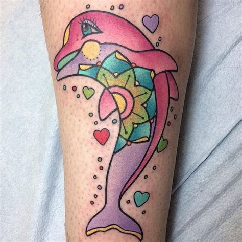 A lisa frank inspired color palette done on my client's thigh!! 15 Nostalgic 90s Tattoos From Your Time Capsule | Tattoodo