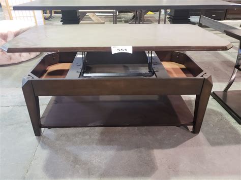 Nuevo costa round glass top coffee table. WOODEN HIDE-AWAY COFFEE TABLE - Able Auctions