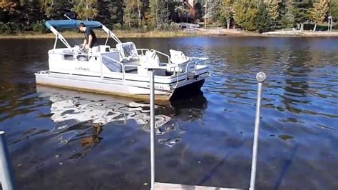 This can be done by burying the legs or by dropping them into cinder blocks that are stable on. Docking the new (old) pontoon boat. - YouTube