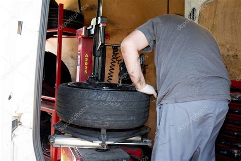 A tire changers purpose is to remove and install tires off and on a rim. Machine for removing the tire from the wheel rim of the ...