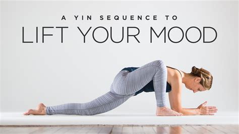 Beautiful woman practicing yoga, seated forward bend, paschimottanasana. A Yin Yoga Sequence to Lift Your Mood | Yoga International