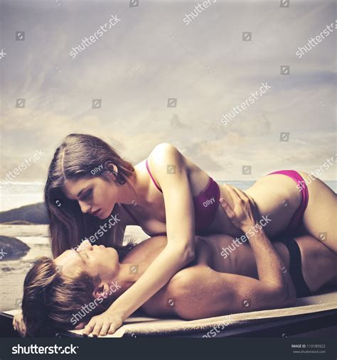 Danejones amazing young women making love. Young Couple At The Seaside Cuddling Stock Photo 110185922 ...