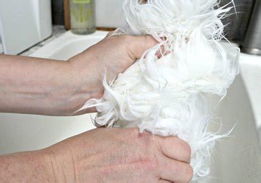 Shaking the rug regularly—preferable outdoors—will remove loose soil and dust and restore the bounce to the wool fibers. How to Clean a Faux Sheepskin Rug | eHow