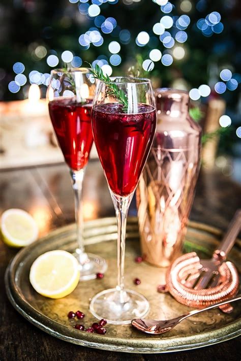 A delicious selection of classic christmas cocktails that are easy to make at home and don't require too many ingredients. Pomegranate French 75 - FoodBlogs.com #holidaydrinks # ...