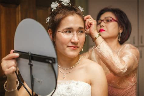 Naomi & Kim - putting the flowers in | Photos by Scott and ...