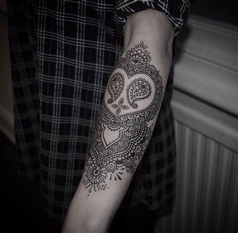 Hand and arm henna tattoo. Henna inspired tattoo on the left forearm.