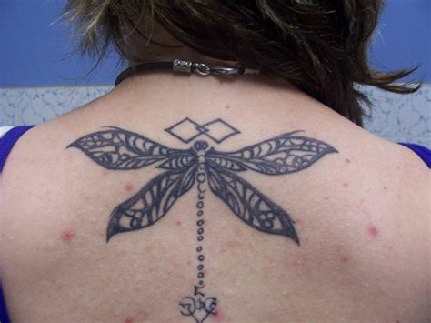 Amazing tribal dragon tattoo idea. Unique Tattos: Tribal Dragonfly Tattoo on Back Body-Body ...