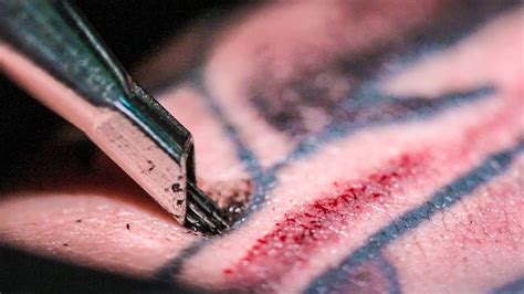 To do it right, you need to lower the tip of the needle into the ink. TATTOOING Close Up (in Slow Motion) - Smarter Every Day ...