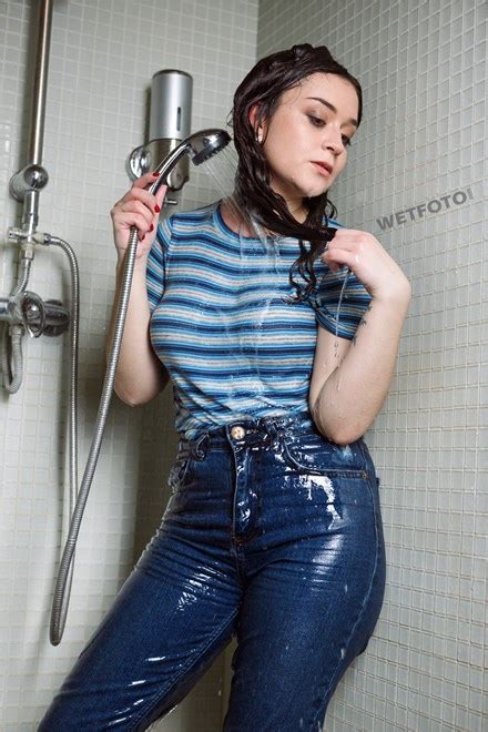 Lady takes a bath and gets wet in leather dress. Beautiful Girl in Skinny Jeans and Blouse Get Soaking Wet ...