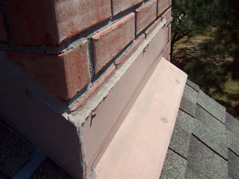 Gray metal roof epdm round pipe stove chimney flashing. Chimney & Flashing Repairs - M&M Roofing, Siding & Windows