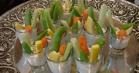 • store serving utensils in food with the handles extended above the rims of the containers. This is a fun and different way to serve vegetables and ...