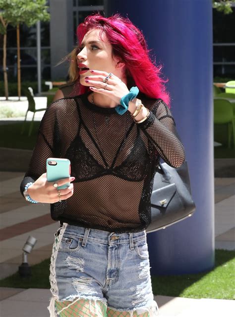 B underline the correct item. Bella Thorne Shows off Her New Freshly Bright Red Dyed ...