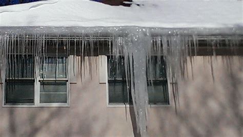 How do you prevent ice dams on roof? Ice Dams and Removal | Roofing Skylight Siding Chimney ...