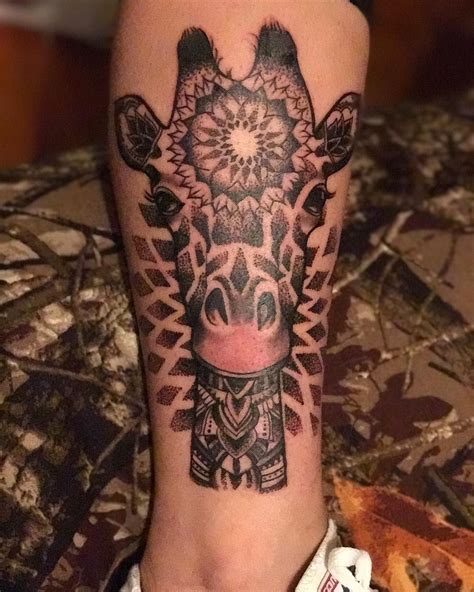 This tattoo signifies intuition, protection, power, strength, vision, grace, passion, and inspiration. Photo by (lovelytrippyhippy) on Instagram | #giraffe # ...