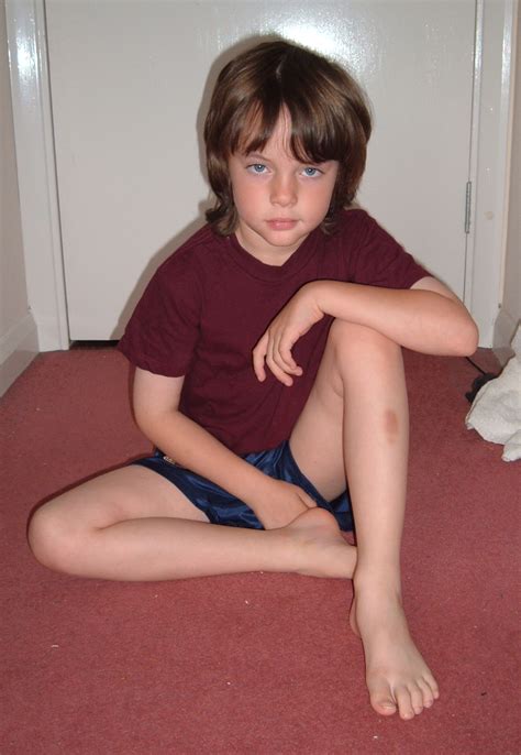 Are you looking for specific photos of boys for your artwork or presentation? boy sitting stock1 by DemoncherryStock on DeviantArt