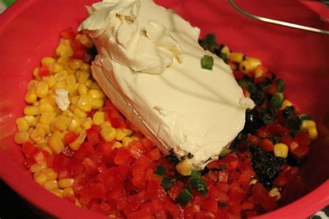 Add diced veggies to cream cheese mixture and fold together with spatula. Skinny Poolside Dip