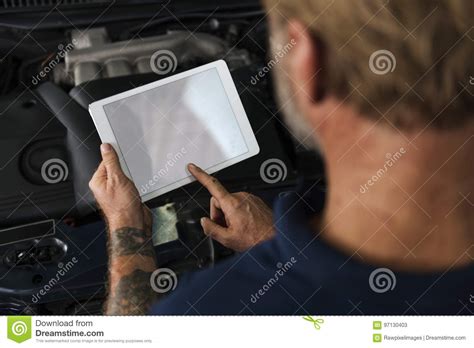 When you hear pc, you probably envision an enclosed device with an attached video screen, keyboard and some type of a pointing device, like a mouse or touchpad. Auto Repair Shop Owner Checking Tablet Concept Stock Image ...