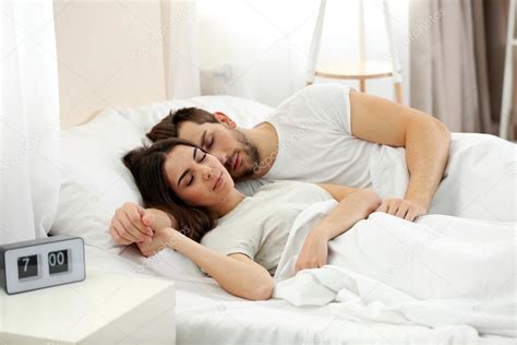 Check spelling or type a new query. Young cute couple sleeping together in bed. — Stock Photo ...