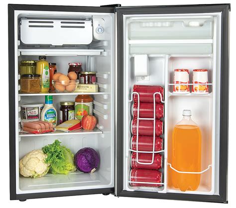 The outdoor kitchen equipped with a refrigerator makes storing food and beverages possible. Igloo 3.2 Cu. Ft. Beverage Dispensing Refrigerator With ...