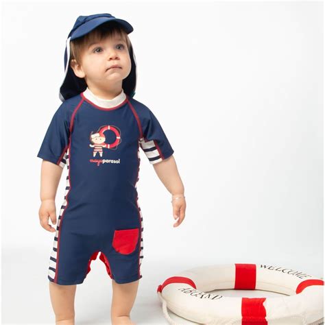 Vêtements, chapeaux, casquettes, combinaisons et t shirt anti uv. Combinaison anti UV bébé garçon Petit Matelot marine ...