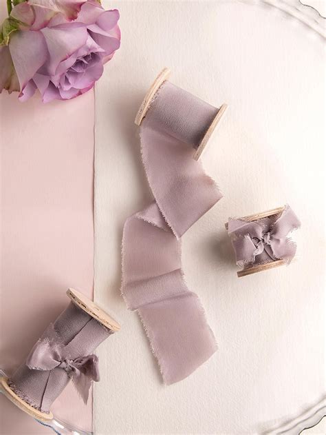 Explore silk worm stock photos. Mauve Silk ribbon / Bouquet ribbon / Wedding ribbon ...