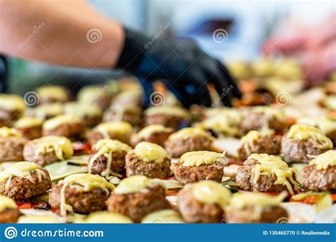 ^ burger king @burgerkinguk (march 8, 2021). Female And Male Chef Putting Ingredients Of Burgers On A ...