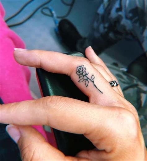 Finger tattoos can be some of the most beautiful and concise body art, conveying symbolism and meaning. 26+ Elegant Finger Tattoos Ideas For Female | Tiny rose ...